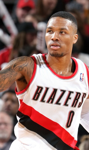 Lillard leads short-handed Blazers over Love, T-Wolves